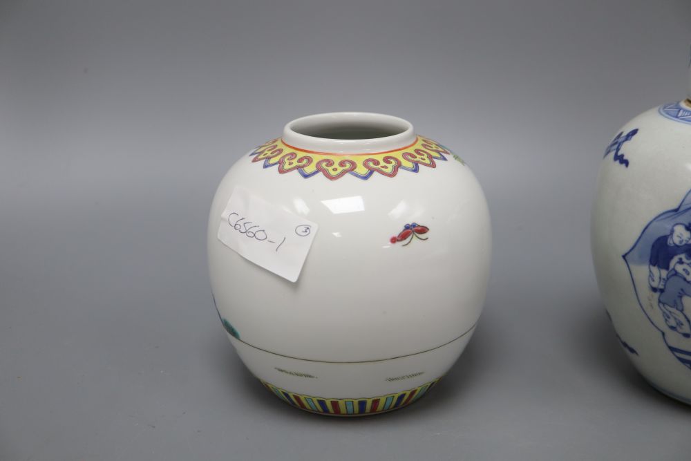 A Chinese blue and white ginger jar and a pair of jars, height 17cm